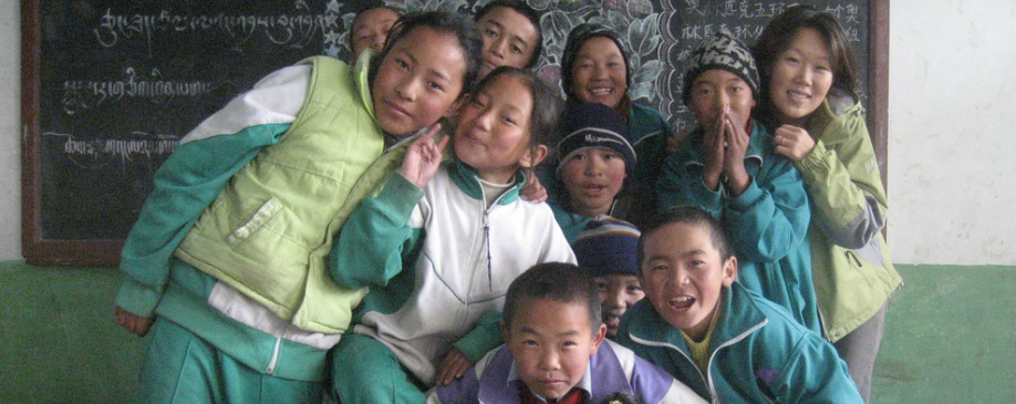 Sunny with orphans in Tibet